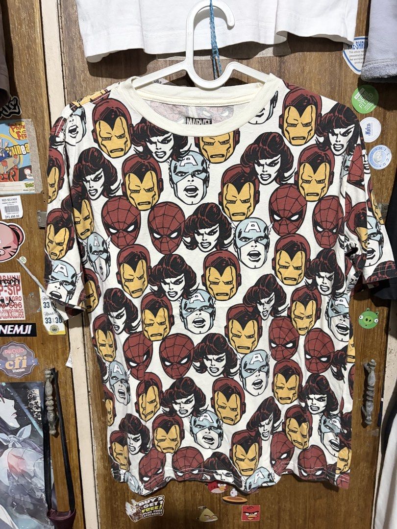 [MARVEL TEE] Marvel Comics All Over Print T-Shirt Size L(14) (Category: Tshirts & Polo Shirts ) located in Imus. Submitted by frootiloots4103 (Listing ID 1463333821, Image 1). Description: - Cool Marvel graphic tee - Features Iron Man, Captain America, and Spider-Man all-over print - Size: L (fits 14 years old) - Measurements: 19" wide x 23" long - Material: 60% Cotton, 40% Polyester - Ideal for any Marvel fan! OPEN FOR NEGO (best if aspack) 📍Im