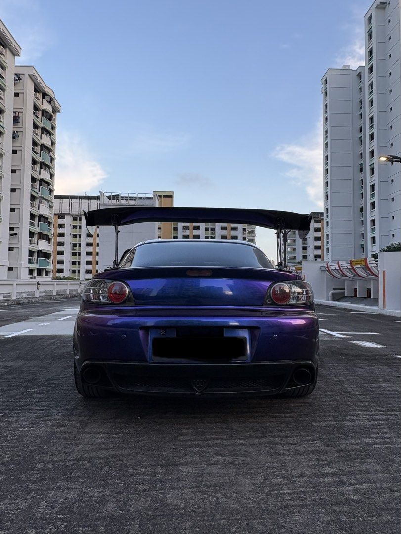 Mazda RX8 1.3 (A) (Category: Used Cars) located in Singapore. Submitted by lionelhowa (Listing ID 1463523592, Image 2). Description: Sadly have to let go for a family car Interiors: - Gearbox overhaul (June 2025) - Full radiator and wiring fix (Nov 2025) - Alignment & Suspension adjustments (April 2026) Exteriors: - Unique purple and blue chameleon paint (Copy GTR 😂) - Aftermarket widebody kit - Carbon fiber skirting - Carbon fiber hood - Carbon