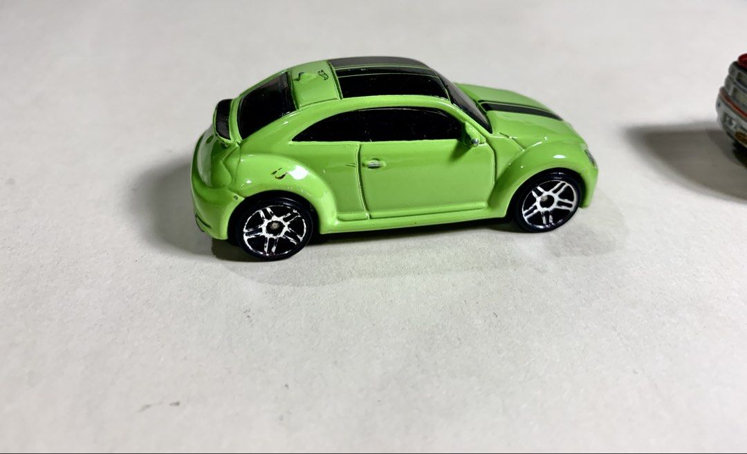 Mbx and Hotwheel 2x lot (Category: Vehicle & Diecast Models) located in Mandaue City. Submitted by maxguiller89260 (Listing ID 1463512115, Image 3). Description: 2 unit lot West Coast sourced thrift item shop 2014 Chevrolet Silverado 1500 double-cab pickup 1:64 standard MBX Explorers Cherry Red non chrome front variant (originally released as number 29/120) Thailand - [ ] Brand: Hot Wheels - [ ] Volkswagen Beetle - [ ] Lime green / black race str