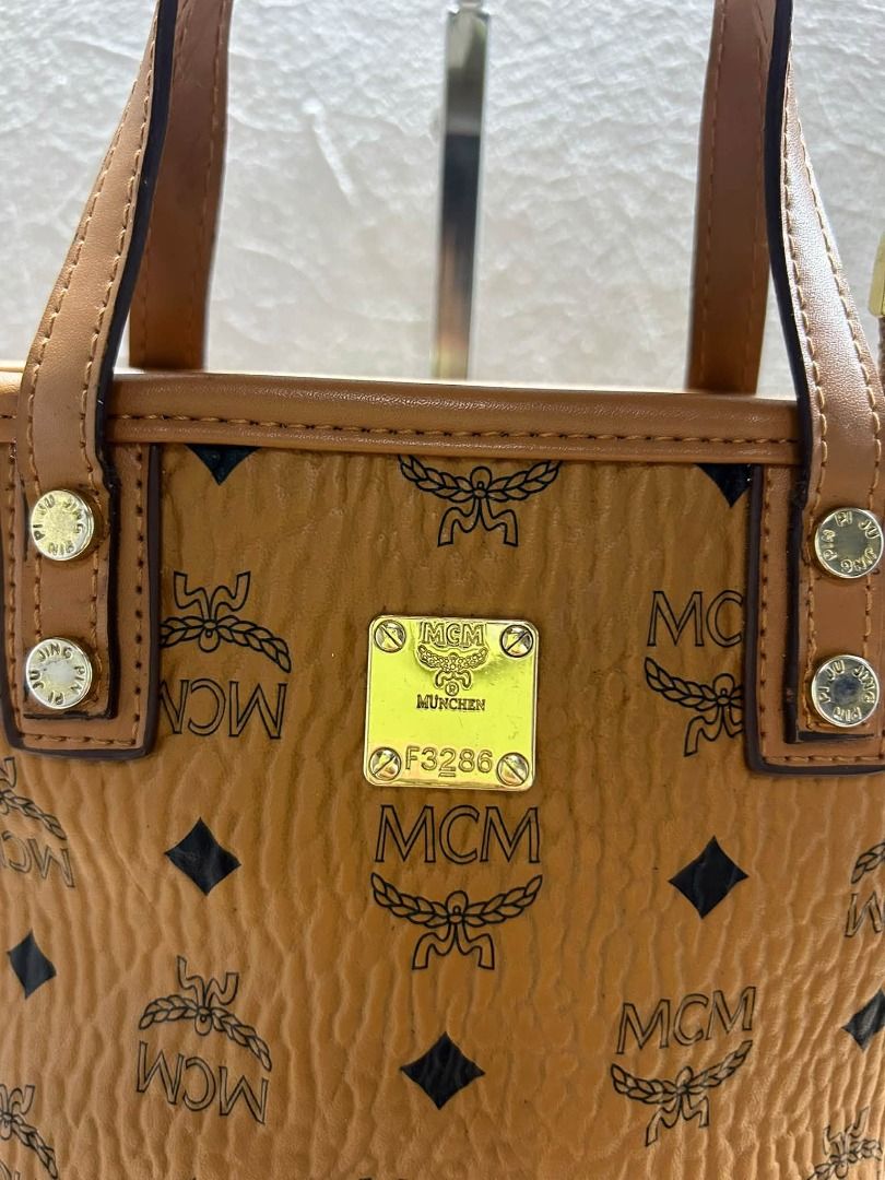 MCM CROSS BODY BAG (Category: Shoulder Bags) located in Caloocan City. Submitted by j3ngsanity (Listing ID 1463498765, Image 2). Description: SUPER MINIMAL RUST GOOD AS NEW CONDITION.