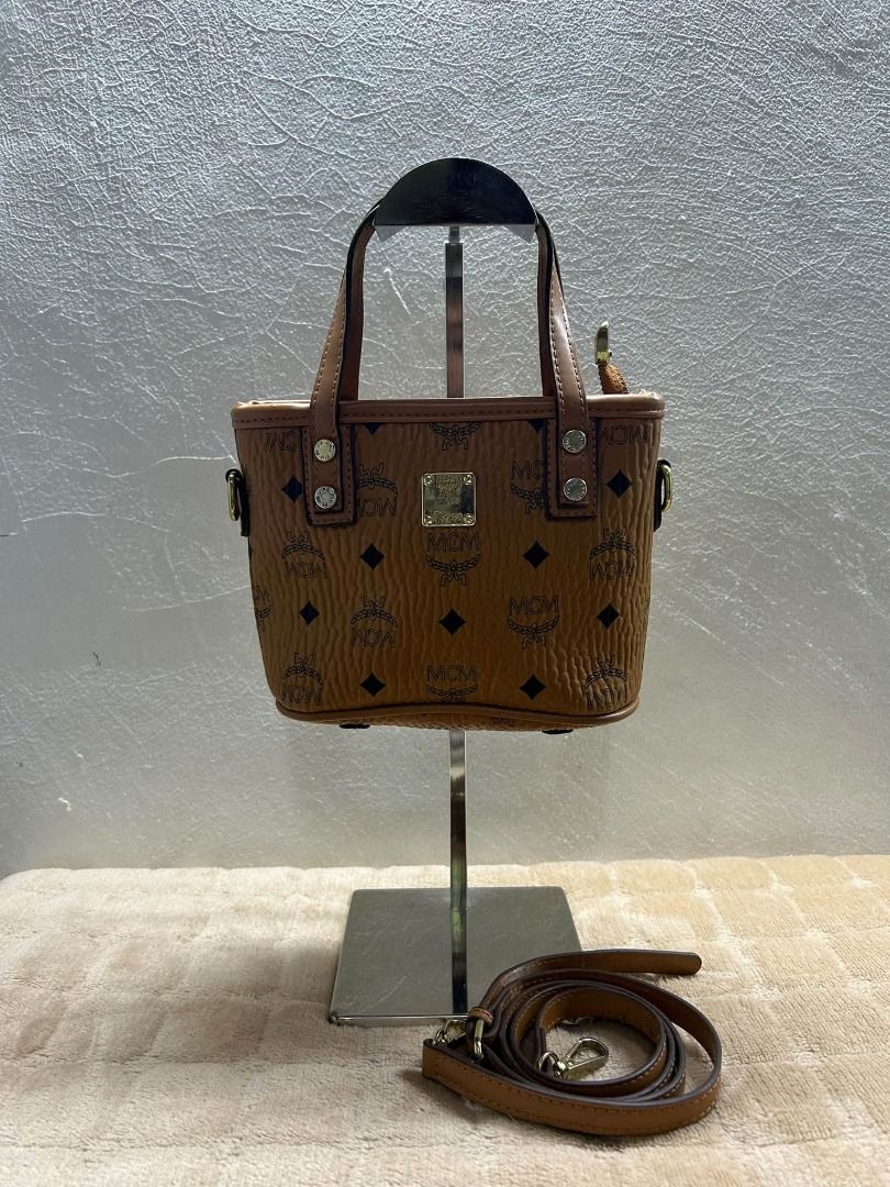 MCM CROSS BODY BAG (Category: Shoulder Bags) located in Caloocan City. Submitted by j3ngsanity (Listing ID 1463498765, Image 1). Description: SUPER MINIMAL RUST GOOD AS NEW CONDITION.