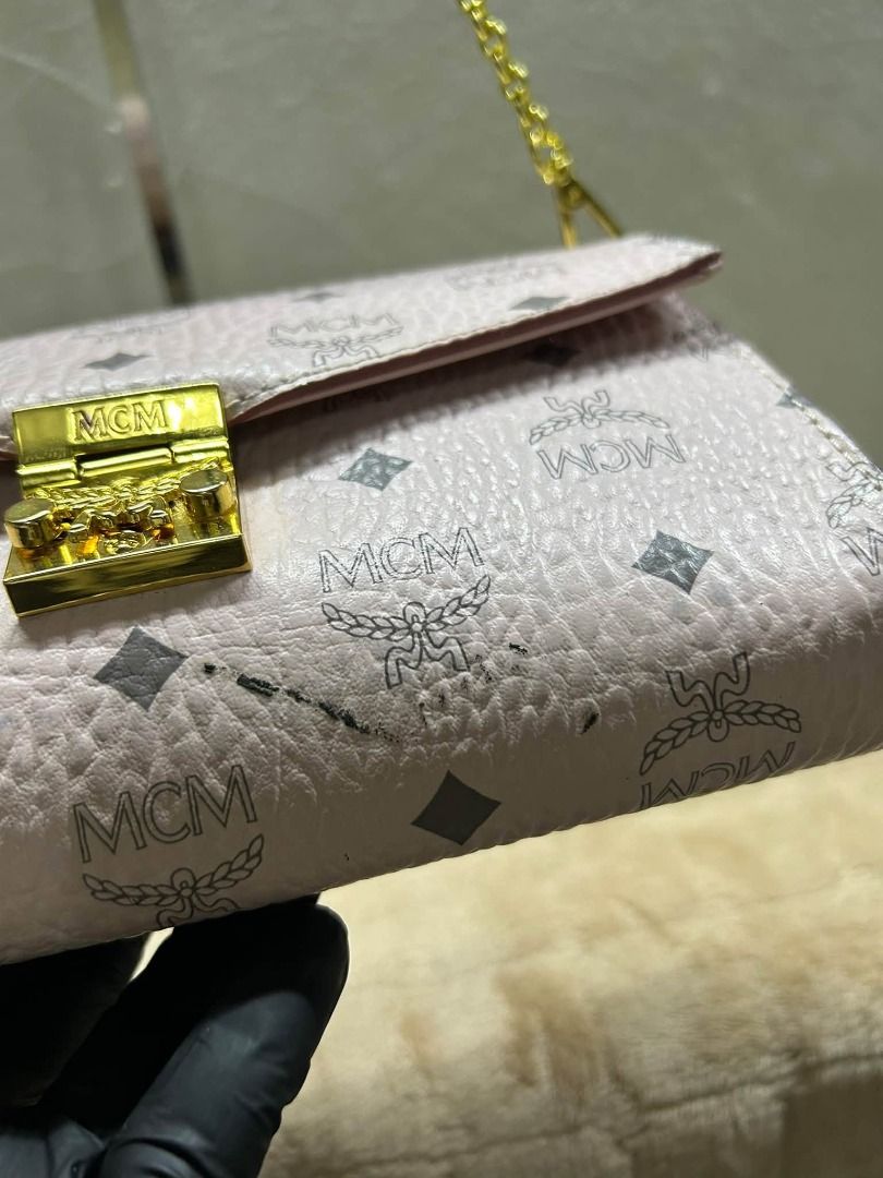 MCM SLING BAG PINK (Category: Cross-body Bags) located in Caloocan City. Submitted by j3ngsanity (Listing ID 1463501565, Image 3). Description: ISSUE : MINIMAL INK STAIN GOOD AS NEW.