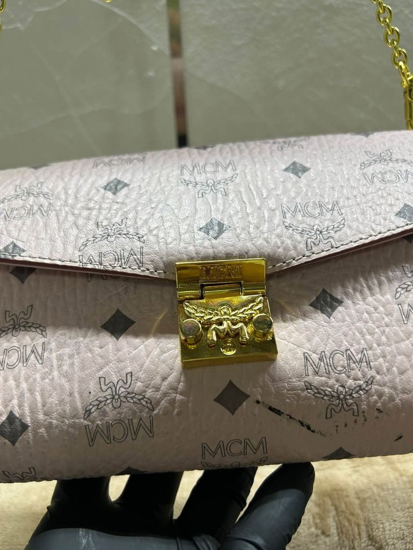 MCM SLING BAG PINK (Category: Cross-body Bags) located in Caloocan City. Submitted by j3ngsanity (Listing ID 1463501565, Image 2). Description: ISSUE : MINIMAL INK STAIN GOOD AS NEW.