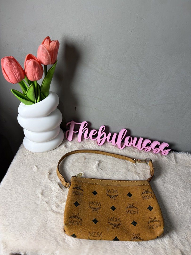 MCM Wallet bag (Category: Luxury Bags & Wallets) located in Manila. Submitted by at_realty (Listing ID 1463500074, Image 2). Description: 8/10 condition .