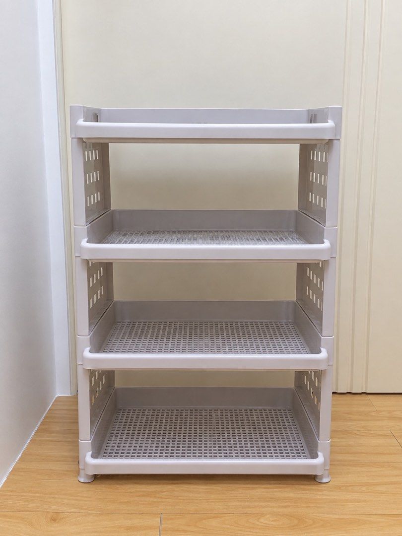 Megabox 4-Tier Plastic Storage Shelf Rack Organizer (Category: Shelves, Cabinets & Racks) located in Cavite. Submitted by marianne.ram (Listing ID 1463430671, Image 1). Description: - Lightweight and easy to assemble 4-tier storage shelf - Perfect for organizing shoes, books, and household items - Open design ensures good ventilation - Made from durable plastic material - Space-saving solution for bathrooms, kitchens, or entryways - Simple to cle