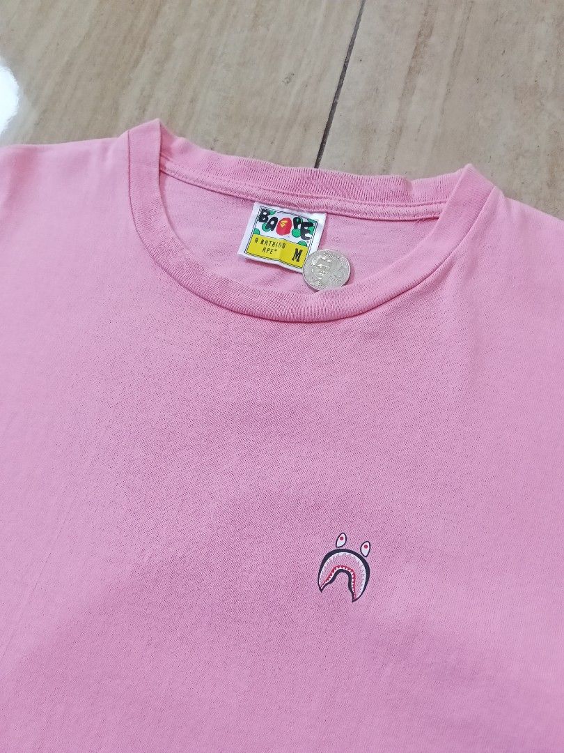 Men's Tshirt (Category: Activewear) located in Glan. Submitted by cpaharodde48008 (Listing ID 1463418693, Image 3). Description: Bape Men's tee Very good to excellent Size Medium Width - 19.5 x Length - 27 No crack print 699 + sf only Dm.