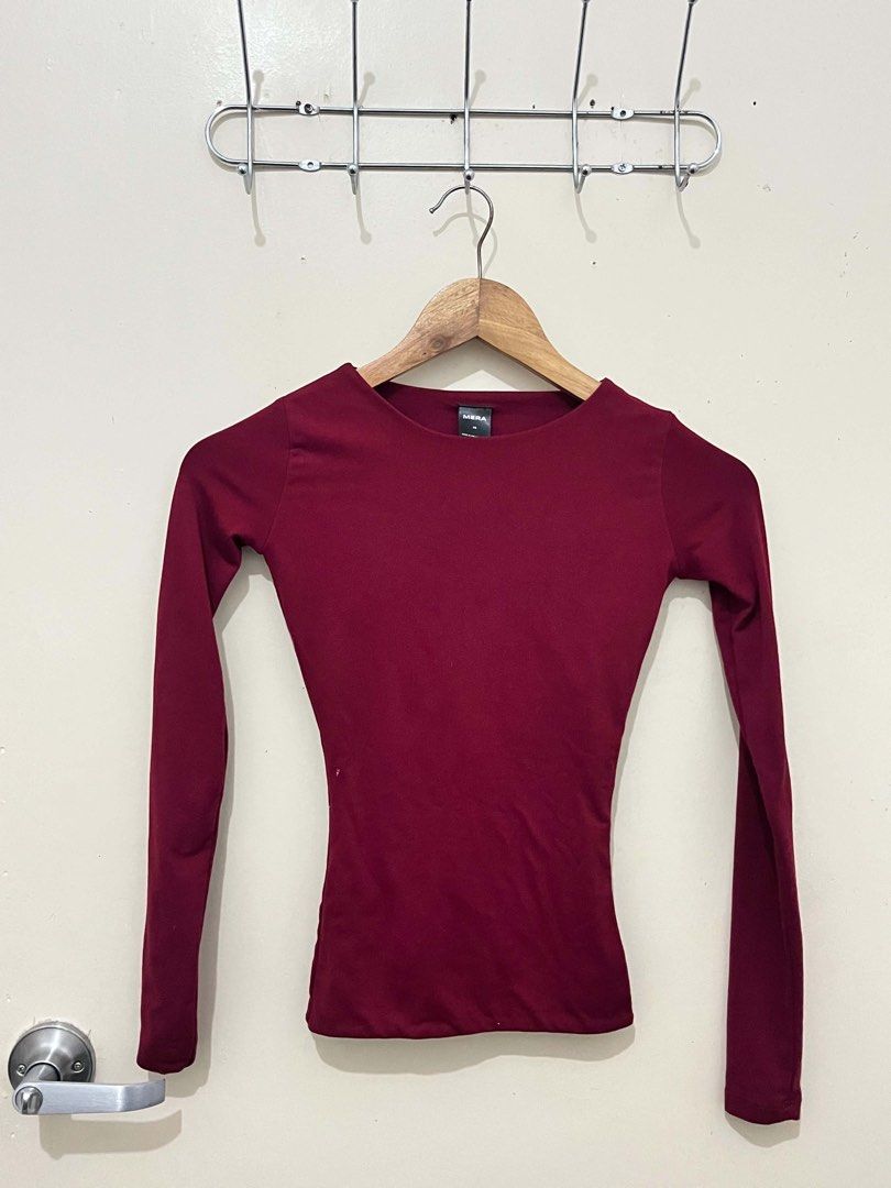 MERA Burgundy Long Sleeve Top (Category: Longsleeves) located in Malolos. Submitted by vanderwoodsen_ (Listing ID 1463424648, Image 1). Description: - Burgundy long sleeve top - Brand: MERA - Simple and fitted design - Soft and stretchy fabric - Tag indicates size small (fits like a small) - Versatile: great for layering or wearing on its own - Easy to pair with jeans or skirts.