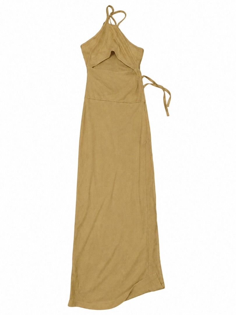 mexi long dress with slit (Category: Dresses) located in Cainta. Submitted by meadow_collection123 (Listing ID 1463510336, Image 1). Description: XS TO SMALL An elegant beige halter-style maxi dress with a flowy, minimalist silhouette. It features a tie-up neckline, a layered bust detail, and a side tie accent for an adjustable fit. Lightweight and breathable fabric, making it perfect for casual days, beach outings, or dressed-up occasions..