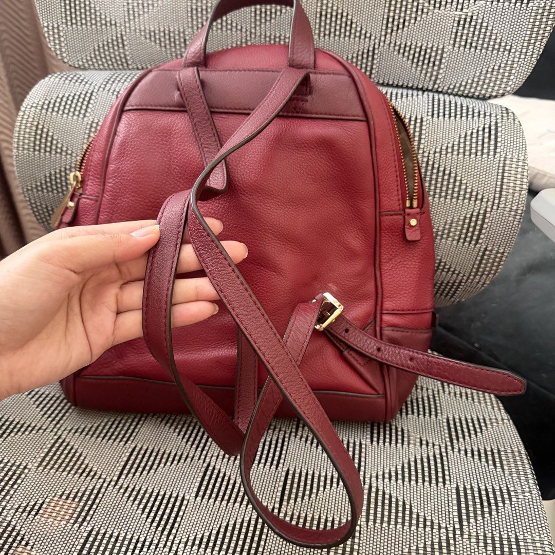 Michael Kors Leather Backpack Burgundy (Category: Backpacks) located in Cebu City. Submitted by eynjlin (Listing ID 1463475184, Image 3). Description: - Michael Kors leather backpack - Deep burgundy color - Gold-tone hardware - Main compartment with zip closure - Interior zip pocket and slip pockets - Adjustable shoulder straps - Ideal for everyday use.
