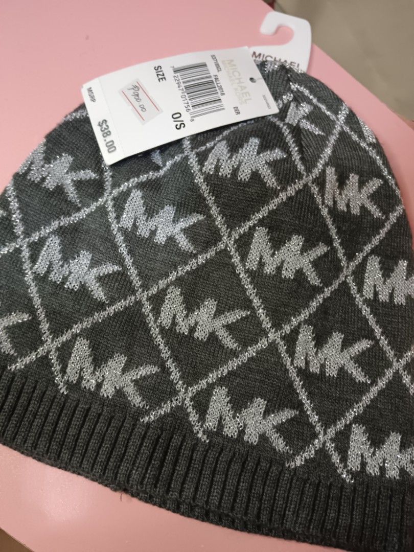 Michael Kors MK Logo Knit Beanie Hat (Category: Hats & Beanies) located in Manila. Submitted by rabpisces23 (Listing ID 1463484246, Image 3). Description: - Grey knit beanie - All-over silver MK logo pattern - Sparkly threads woven in - Comes with original tags - Size: One Size (O/S) - Original MSRP: $38.00.
