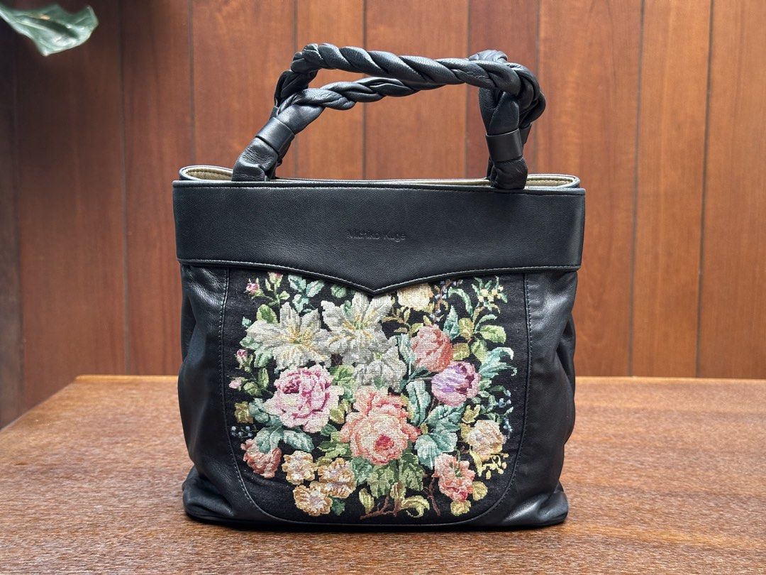 Michiko Kuge handbag (Category: Shoulder Bags) located in Bulacan. Submitted by thriftbagcollections (Listing ID 1463394971, Image 1). Description: Michiko Kuge handbag featuring a colorful floral petit point tapestry panel and a braided leather handle,looks unused.Approx;H-8”W-8.5”D-3.7”handle 5.5”.