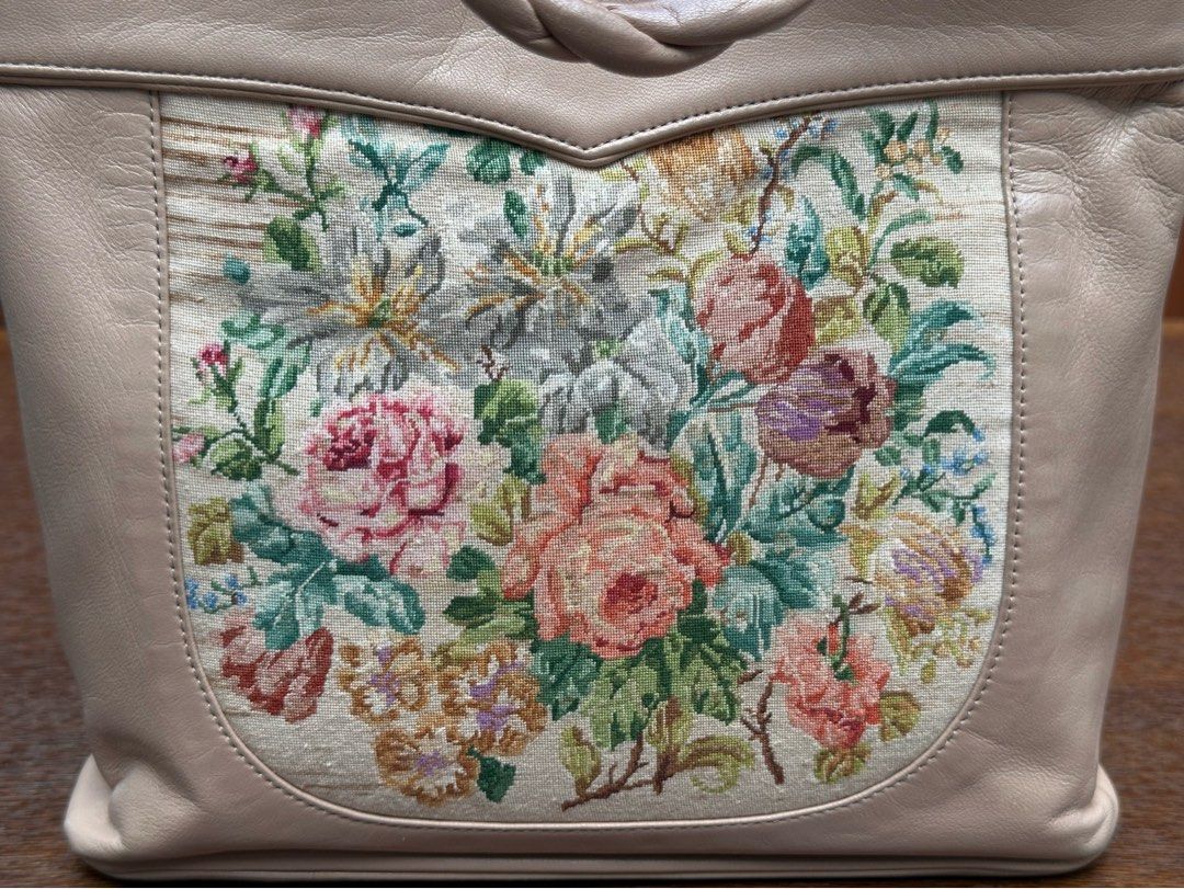 Michiko Kuge handbag cream (Category: Shoulder Bags) located in Bulacan. Submitted by thriftbagcollections (Listing ID 1463395132, Image 2). Description: Michiko Kuge handbag featuring a colorful floral petit point tapestry panel and a braided leather handle,looks unused.Approx;H-8”W-8.5”D-3.7”handle 5.5”.