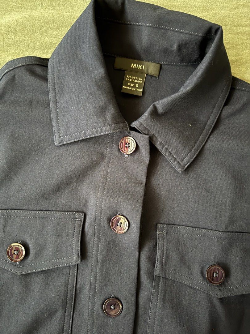 MIKI Navy Blue Cropped Button-Up Jacket (Category: Coats, Jackets and Outerwear) located in Manila. Submitted by tricia_lara (Listing ID 1463357690, Image 3). Description: Got this from vietnam at around 1400 pesos!! :) never worn but washed once :) it’s very light & perfect for chill fits or work fits 🫶🏻.