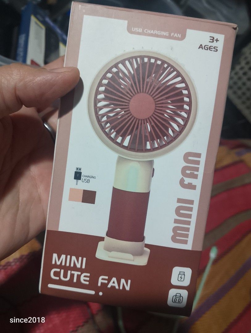Mini Cute Fan USB Charging Portable Handheld Fan (Category: Fans) located in Quezon City. Submitted by sellingwithlove2018 (Listing ID 1463349616, Image 2). Description: - Mini cute fan - USB charging - 3 speed modes - 1.5W output power - 2-4 hours charging time - Compact size: 8.3*6.2*16.5cm - Lightweight: 115g - Hindi pa nagagamit.