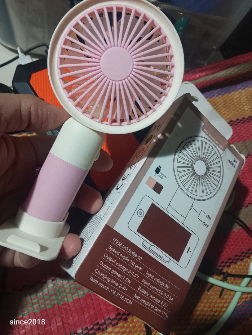Mini Cute Fan USB Charging Portable Handheld Fan (Category: Fans) located in Quezon City. Submitted by sellingwithlove2018 (Listing ID 1463349616, Image 1). Description: - Mini cute fan - USB charging - 3 speed modes - 1.5W output power - 2-4 hours charging time - Compact size: 8.3*6.2*16.5cm - Lightweight: 115g - Hindi pa nagagamit.