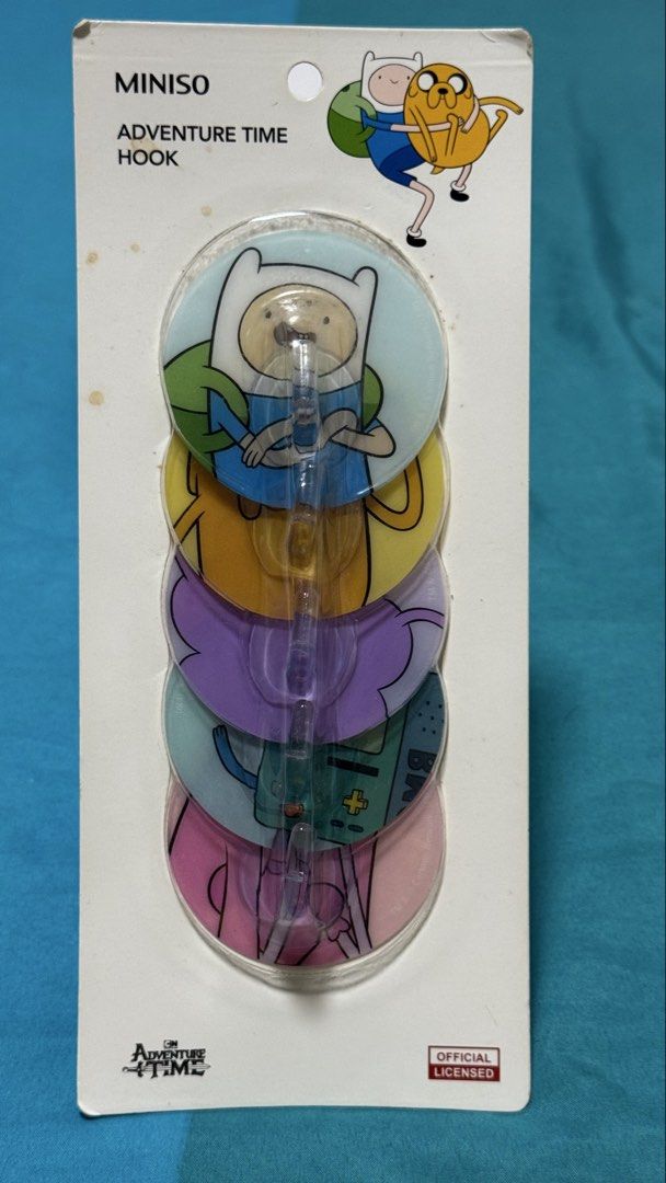 MINISO Adventure Time Hook Set (5 Pack) (Category: Character Goods) located in Caloocan City. Submitted by liansp (Listing ID 1463507826, Image 1). Description: Official licensed product in collaboration with Miniso. Never used. Items are pristine, medyo madumi lang yung packaging due to storage. RFS: decluttering.