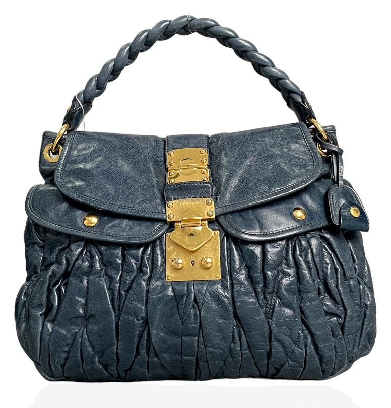 Miumiu Gray Matelasse Nappa Leather Coffer Hobo Bag (Category: Luxury Bags & Wallets) located in Caloocan City. Submitted by hermes_evangelista (Listing ID 1463334721, Image 1). Description: Show off your style with this versatile investment piece. The Miu Miu Gray Matelasse Nappa Leather Coffer Hobo Bag has a fantastic braided top handled as well as a shoulder strap for hands-free convenience when you feel like it. The matelasse leather is butte