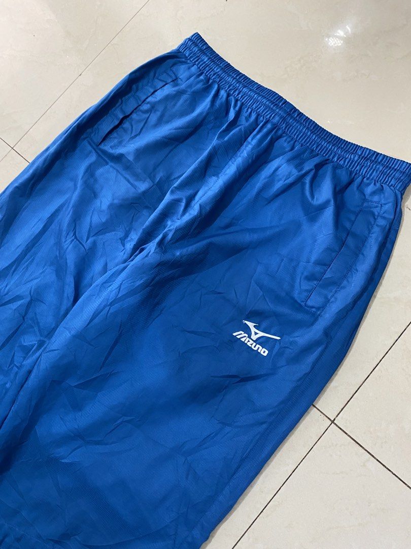 MIZUNO PLUS ROYAL BLUE TRACK NYLON PANTS (Category: Jeans) located in Talisay. Submitted by hustlethrift_2600 (Listing ID 1463375944, Image 2). Description: MIZUNO PLUS ROYAL BLUE TRACK NYLON PANTS 30-40 W 41 L 9 Hem Very Good Condition 9.8/10 Colo Rate Quick Dry Lightweight Water Resistant Fabric With Zipper ( Both Hem ) Issue : Penhole ( Parang paso sya tas nagka butas but d tagus at unnoticeable ).
