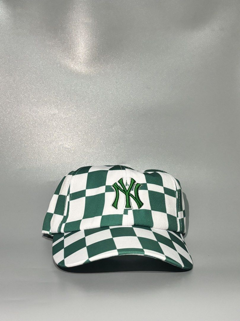 MLB New York Yankees Checkerboard Cap Green White (Category: Caps & Hats) located in Manila. Submitted by gilmorecapz (Listing ID 1463441123, Image 1). Description: - Cool green and white checkerboard design - Embroidered NY Yankees logo on the front - Adjustable strap for a comfortable fit - MLB official product with QR code verification - Perfect for everyday casual wear.