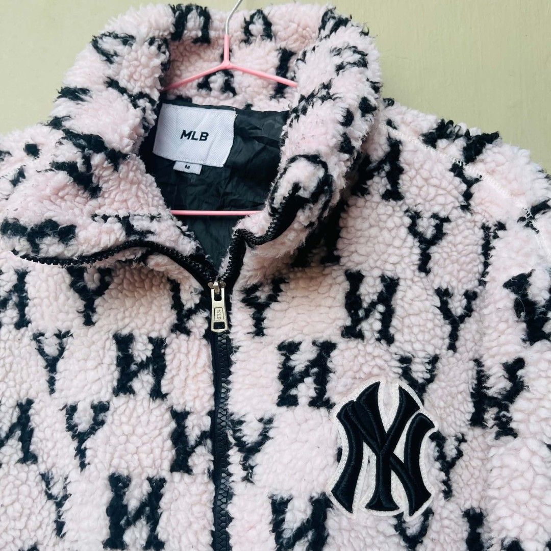 MLB New York Yankees Monogram Fleece Jacket Pink (Category: Coats, Jackets and Outerwear) located in Bulacan. Submitted by fenph2021 (Listing ID 1463467840, Image 2). Description: - Super cozy MLB fleece jacket - All-over pink and black monogram print - Iconic NY Yankees logo - Full zip front s-xl kasya M on tag - Tagged size M - Great for staying warm and stylish - Perfect for any MLB fan last price posted 16k sa online complete tags.
