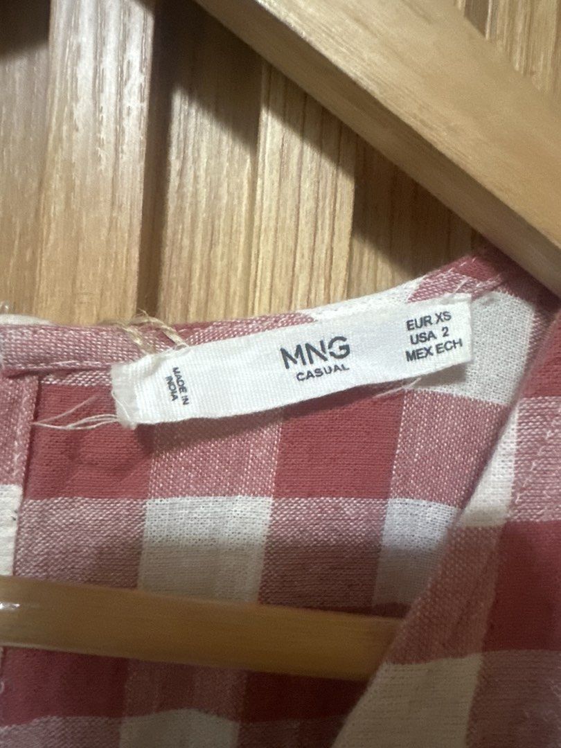 MNG Casual Red Gingham Button Front Midi Dress (Category: Dresses) located in Tarlac. Submitted by kishya2024 (Listing ID 1463454441, Image 3). Description: - MNG Casual red and white gingham midi dress - Short sleeves - V-neckline - Functional front buttons - Convenient pockets - Ideal for casual outings and picnics.