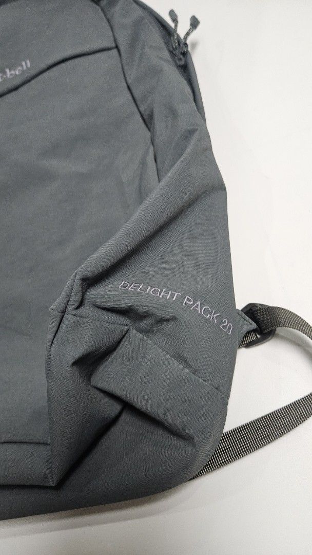 Mont-bell Delight Pack 20 Backpack (Category: Backpacks) located in Alfonso. Submitted by jbcamet (Listing ID 1463522226, Image 2). Description: - Mont-bell Delight Pack 20 - Color: Dark Grey - Lightweight and durable construction - Main compartment with internal mesh pocket - Front zip pocket for easy access - Padded shoulder straps for comfort - Ideal for day trips and everyday use.