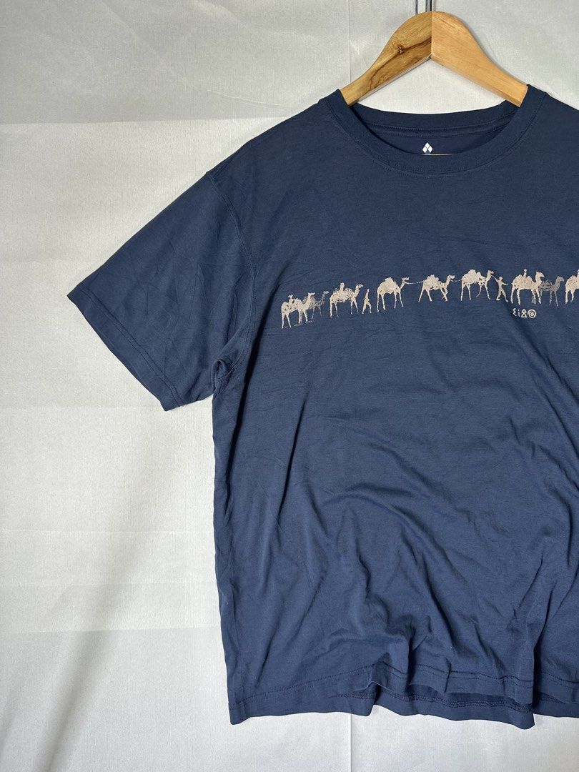 Montbell Navy Blue Camel Print Tee (Category: Tshirts & Polo Shirts ) located in Cabanglasan. Submitted by thefashiongarage.co (Listing ID 1463392149, Image 3). Description: Title - Montbell Model/Name - Size on Tag - XL Can Fit Large Conditiion - Excellent as new with no issue Dimension (WxLxH) - 22x27 inches Category- Casual/Outdoor Fitting - Slim Made in - Vietnam Material - 100% Cotton Color - Navy Blue Design - Printed Camel Year - Inclusion