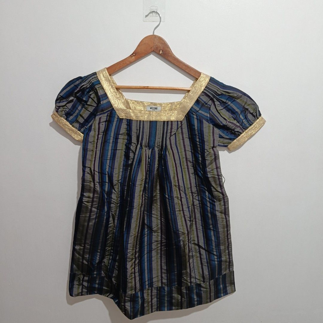Moschino Blouse womens (Category: Blouses) located in Manila. Submitted by goodsrags (Listing ID 1463509531, Image 1). Description: What you see is what you get 31L/19W armpit to armpit 17.