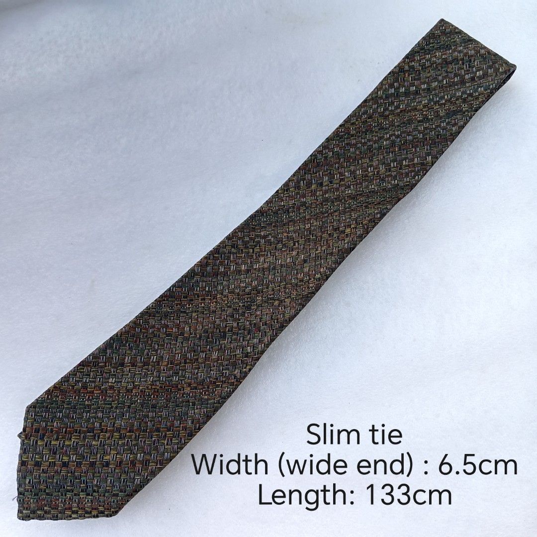 Multicolor Woven Basketweave slim necktie / tie (Category: Ties) located in Abucay. Submitted by gibzzz123 (Listing ID 1463372569, Image 2). Description: • All items are ON HAND and ready to be shipped/picked up. • Items are preloved/ukay, so please expect minimal signs of usage unless stated otherwise. • No major issues — good condition unless otherwise indicated in the listing. • Actual color may slightly vary due to lighting and screen setting