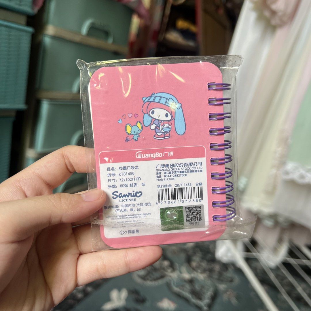 My Melody Mini Notebook Spiral Bound Sanrio (Category: Stationery & School Supplies) located in Quezon City. Submitted by mei_declutters (Listing ID 1463402881, Image 2). Description: - Adorable My Melody notebook with a pink cover. - Features My Melody and a cute little mouse design. - Spiral-bound for easy page flipping. - Ideal for taking notes or drawing doodles. - Compact and portable size for on-the-go use. - Authentic Sanrio licensed produ
