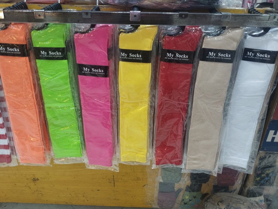 My Socks Knee High Socks - Various Colors (Category: Socks) located in Manila. Submitted by zdmal (Listing ID 1463344266, Image 1). Description: - Brand: My Socks - Style: Knee-high socks - Colors Available: Bright Orange, Neon Green, Hot Pink, Yellow, Red, Beige, White - Material: Comfortable and stretchy - Perfect for: Everyday wear or costumes.