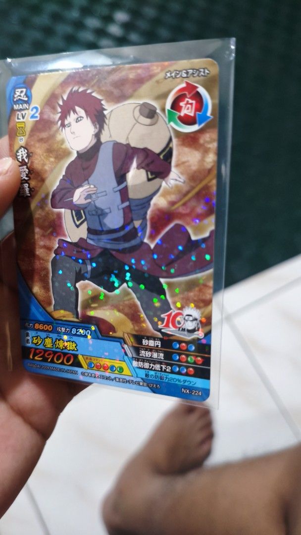 Naruto Card Gaara NX-224 (Category: Raw Singles) located in Caloocan City. Submitted by drian_00 (Listing ID 1463395617, Image 2). Description: - Naruto Trading Card: Gaara - Card Number: NX-224 - Type: Main & Assist - Level: 2 - Stats: Attack 8600, Defense 8200, Special Attack 12900 - Condition: In protective sleeve - Ideal for: Naruto fans and collectors.