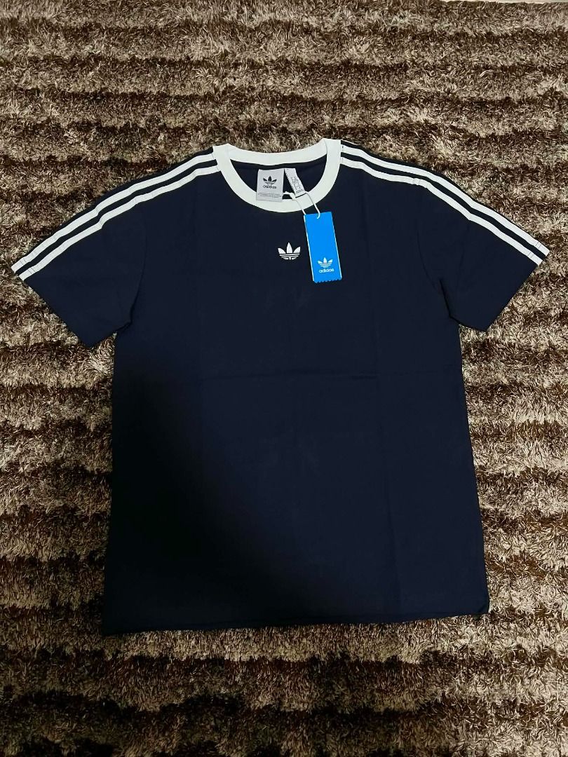 Navy Adidas Original T shirt (Category: Tshirts & Polo Shirts ) located in Manila. Submitted by actd_luxury (Listing ID 1463540193, Image 1). Description: xl:21x28.