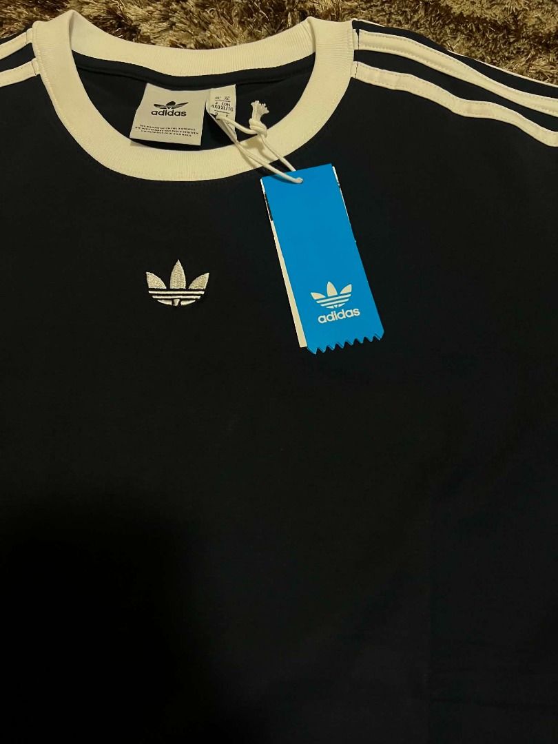 Navy Adidas Original T shirt (Category: Tshirts & Polo Shirts ) located in Manila. Submitted by actd_luxury (Listing ID 1463540193, Image 2). Description: xl:21x28.