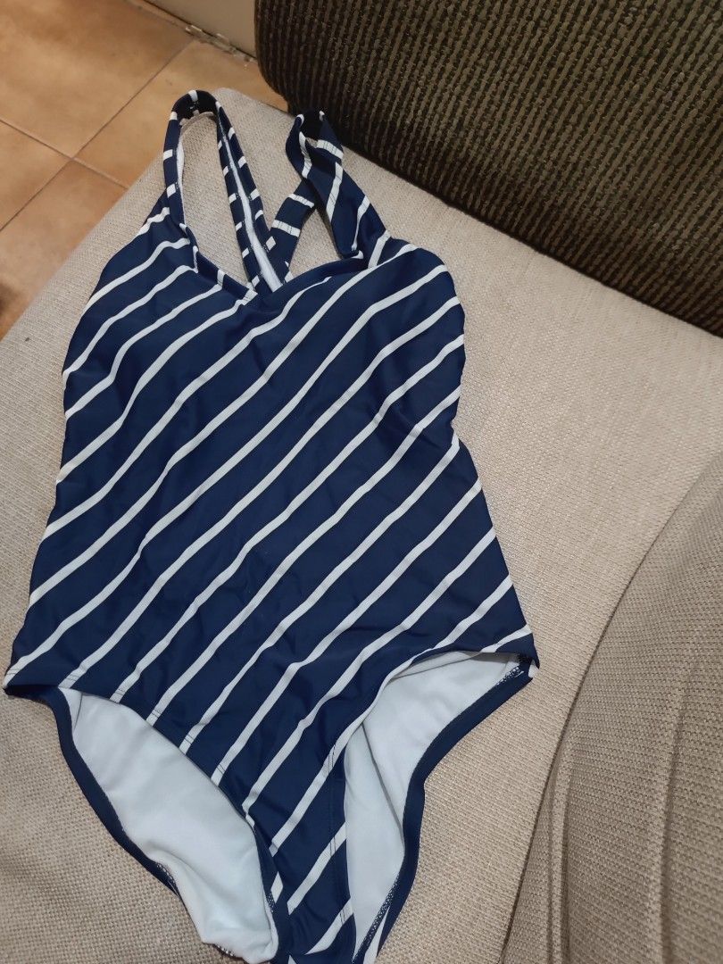 Navy and White Striped One-Piece Swimsuit (Category: Bikinis & Swimsuits) located in Paranaque City. Submitted by raks.cruz (Listing ID 1463380331, Image 2). Description: - Navy and white striped one-piece swimsuit - Features stylish criss-cross strap detail at the back - Comfortable and chic for beach or pool outings - Ideal for summer fun and your next vacation!.