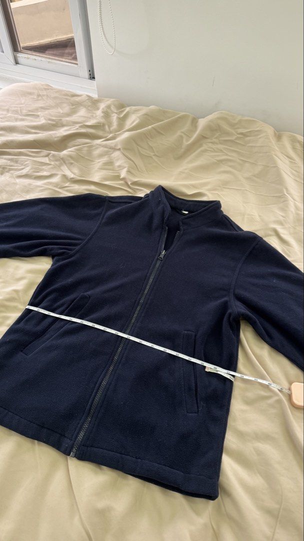 Navy Blue Fleece Zip-Up Jacket (Category: Coats, Jackets and Outerwear) located in Santa Rosa. Submitted by cmasangkay (Listing ID 1463338859, Image 3). Description: - Full zip-up front with stand-up collar - Two convenient side pockets - Ideal for layering on cooler days - Check photo ref for sizing .