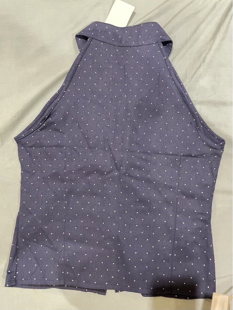 Navy Blue Polka Dot Halter Neck Sleeveless Top (Category: Sleeveless) located in Davao. Submitted by taegikook (Listing ID 1463524548, Image 3). Description: - Brand new, never worn and still w/ tags! - Bought in SG but it’s too big on me 😅 - See measurements in last pics! - Width: 18 inches, Length: 23 inches - Button-up front with collar + Fitted waist for a flattering silhouette Loc: Davao City MOD: J&T, Flash Express.