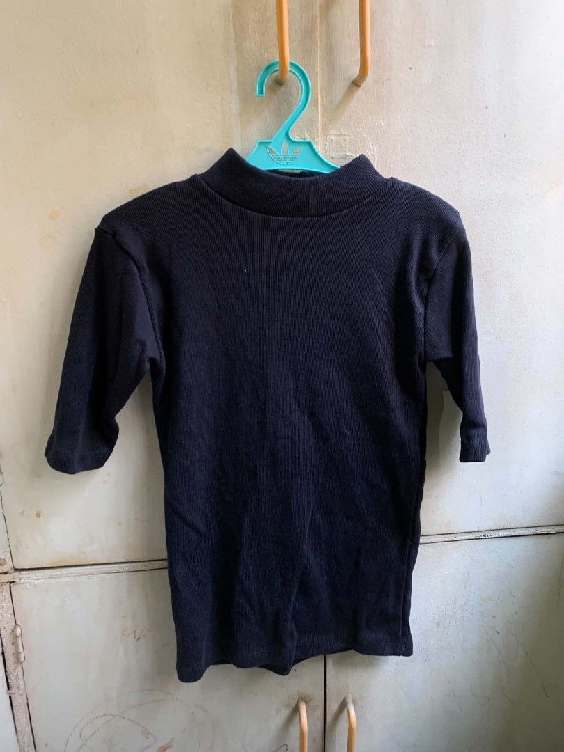 Navy Blue Ribbed Mock Neck 3/4 Sleeve Top (Category: Blouses) located in Manila. Submitted by usagichan_rabbit (Listing ID 1463341563, Image 1). Description: - Navy blue ribbed top - Mock neck design - 3/4 length sleeves - Snug, form-fitting style - Versatile for layering or standalone wear xs only.