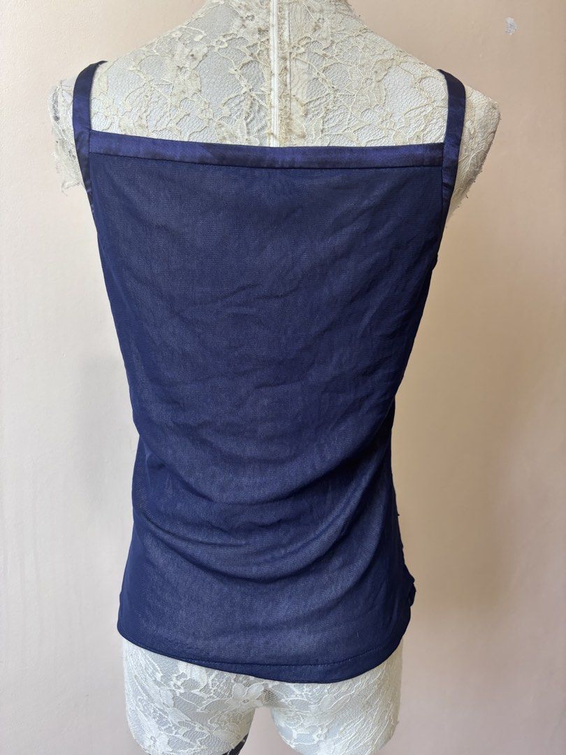 Navy Blue Sequin V-Neck Tank Top (Category: Sleeveless) located in Manila. Submitted by galitsabarat (Listing ID 1463551445, Image 3). Description: S to M size - Navy blue sheer tank top - All-over small shimmering sequins - V-neckline with sparkly embellishments - Thin satin straps - Ideal for layering or wearing solo - Adds a touch of sparkle to any outfit.