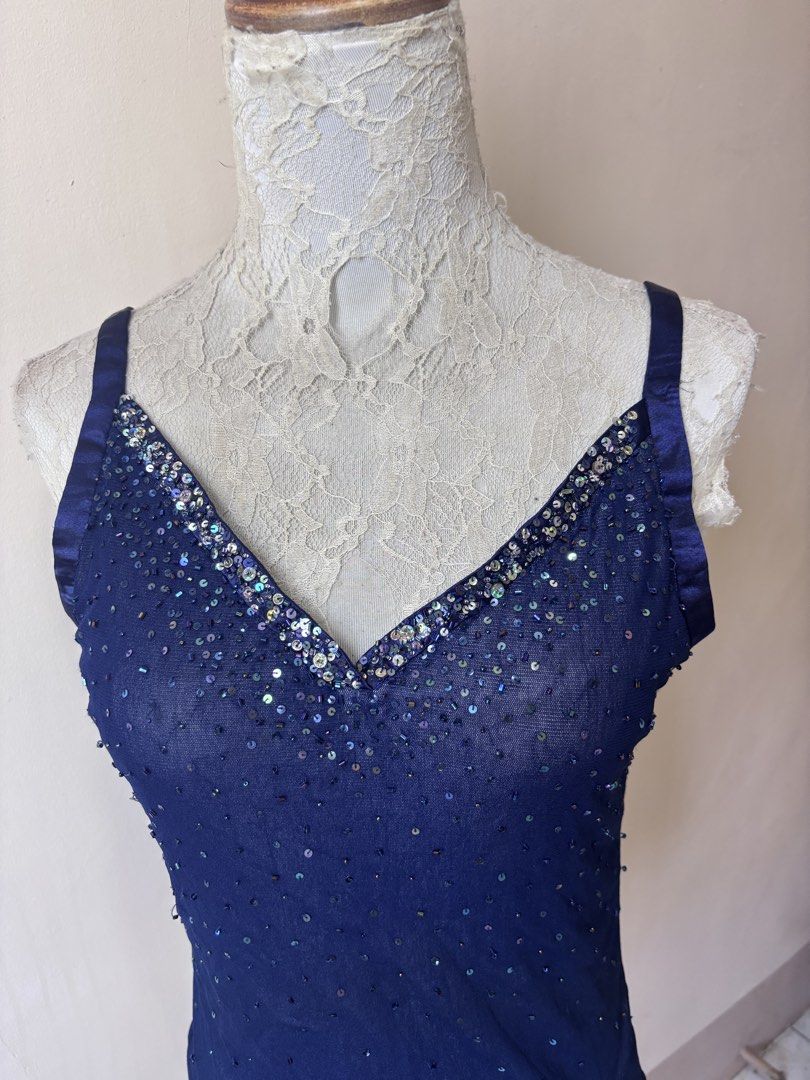 Navy Blue Sequin V-Neck Tank Top (Category: Sleeveless) located in Manila. Submitted by galitsabarat (Listing ID 1463551445, Image 2). Description: S to M size - Navy blue sheer tank top - All-over small shimmering sequins - V-neckline with sparkly embellishments - Thin satin straps - Ideal for layering or wearing solo - Adds a touch of sparkle to any outfit.