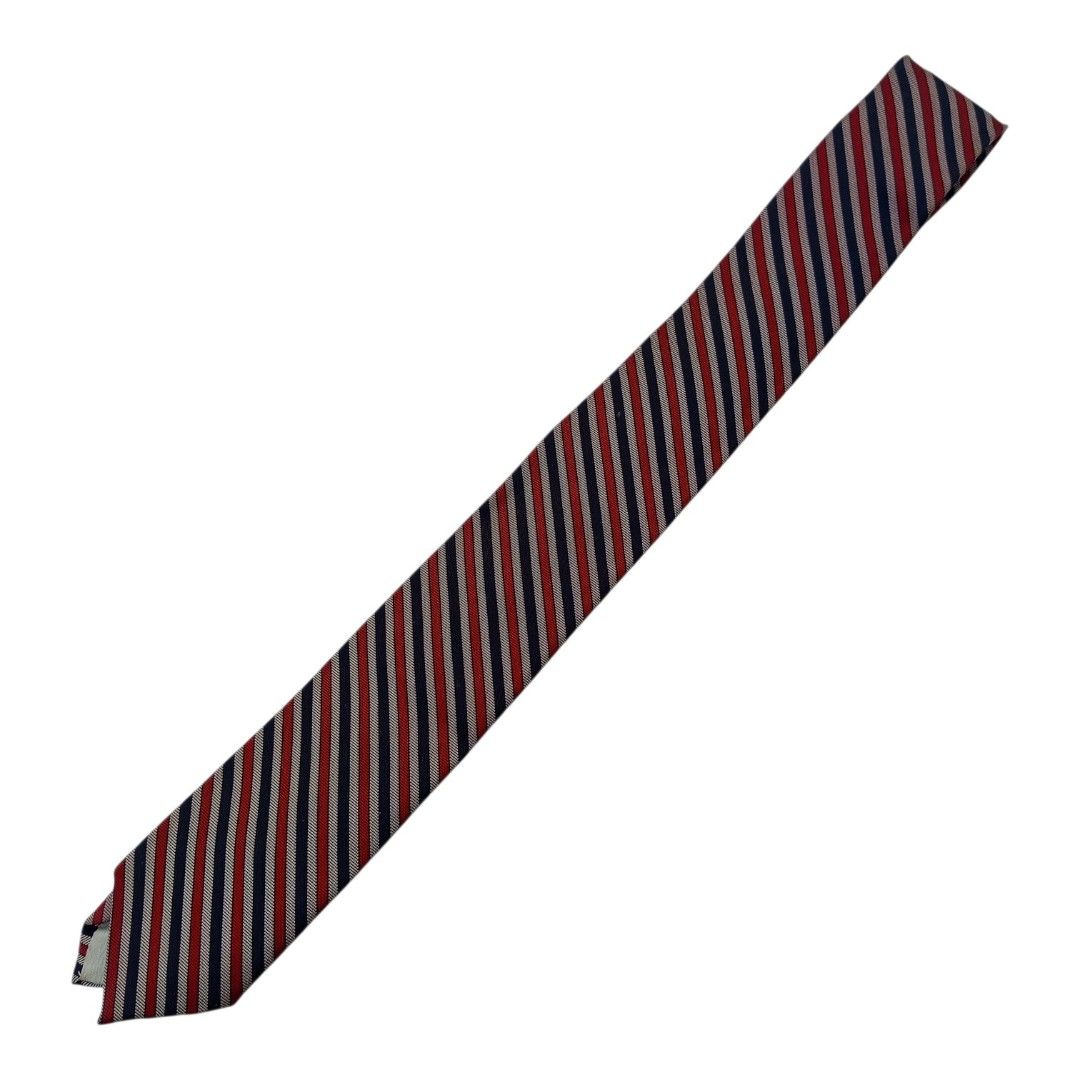Navy, Red & Cream Diagonal Repp Striped necktie (Category: Ties) located in Abucay. Submitted by gibzzz123 (Listing ID 1463375488, Image 1). Description: • All items are ON HAND and ready to be shipped/picked up. • Items are preloved/ukay, so please expect minimal signs of usage unless stated otherwise. • No major issues — good condition unless otherwise indicated in the listing. • Actual color may slightly vary due to lighting and screen setting