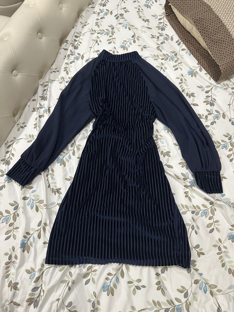 Vintage Dress (Category: Dresses) located in Davao. Submitted by secondlife.authentic (Listing ID 1463474483, Image 1). Description: - Navy blue dress with luxurious velvet vertical stripes - Elegant mock neck design - Long, sheer balloon sleeves with comfortable ribbed cuffs - Flattering elasticated waist for a perfect fit - Subtle and chic scalloped hemline - Ideal for a night out or any special occasion.