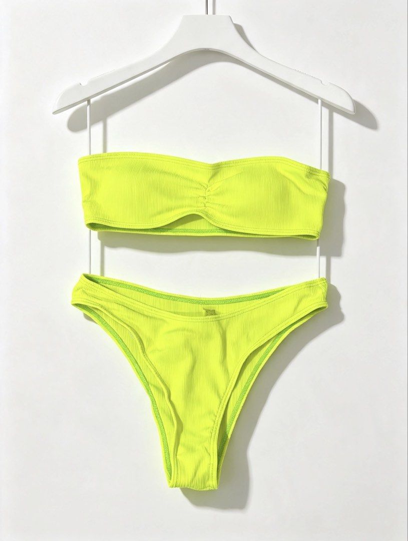 Neon Yellow Ribbed Bandeau Bikini Set (Category: Bikinis & Swimsuits) located in Manila. Submitted by declutterwith_nics (Listing ID 1463376950, Image 1). Description: - Used once - Bright neon yellow bikini - Ribbed texture all over - Bandeau top with ruching detail - High-cut bottoms - Perfect for beach or pool - Super vibrant color that pops!.