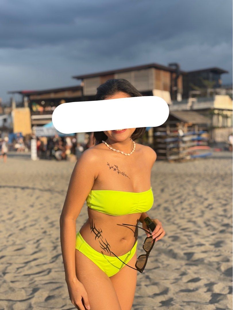 Neon Yellow Ribbed Bandeau Bikini Set (Category: Bikinis & Swimsuits) located in Manila. Submitted by declutterwith_nics (Listing ID 1463376950, Image 2). Description: - Used once - Bright neon yellow bikini - Ribbed texture all over - Bandeau top with ruching detail - High-cut bottoms - Perfect for beach or pool - Super vibrant color that pops!.