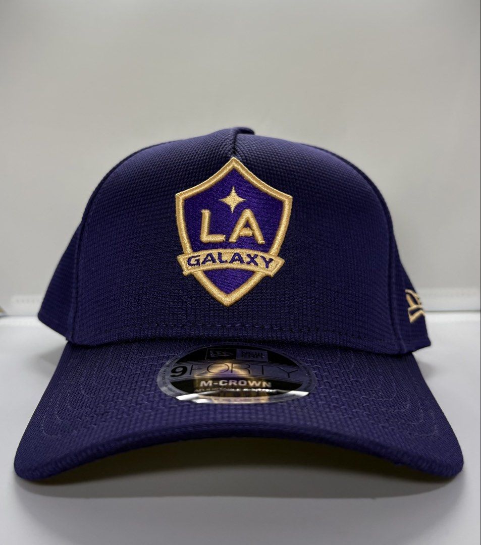 New Era Cap (Category: Caps & Hats) located in Davao. Submitted by daph_ron0831 (Listing ID 1463531569, Image 1). Description: Men's LA Galaxy New Era Purple 2025 Jersey Hook 9FORTY M-Crown Adjustable Hat Bought in Lalaport Mall, Kuala Lumpur Malaysia. This comes with a NE shopping bag. Note: +Shipping fee.