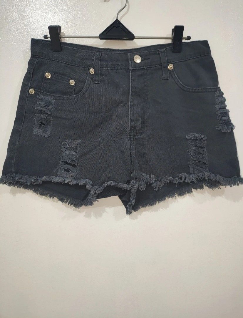 NEXT JEANS Distressed Denim Shorts Size M (Category: Shorts) located in Quezon City. Submitted by maxsab (Listing ID 1463549454, Image 1). Description: - Brand: NEXT JEANS - Color: Grey Denim - Style: High-waisted shorts - Features: Distressed look with rips and frayed hem - Size: Medium (M) - Occasion: Casual wear.