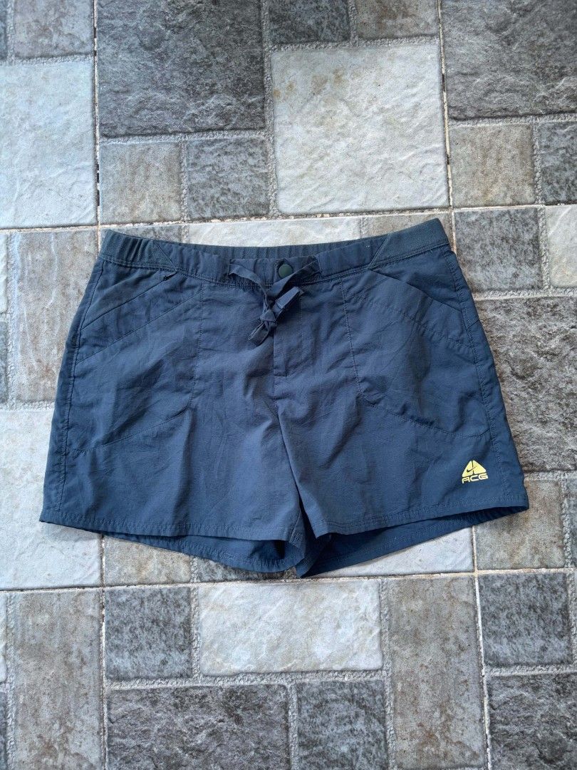 Nike ACG Shorts Size M Dark Grey (Category: Shorts) located in Iriga City. Submitted by thrifttobicol29 (Listing ID 1463451609, Image 1). Description: - Nike ACG Shorts - Color: Dark Grey - Size: Medium (M) - Features: Elastic waistband with drawstring, multiple pockets - Ideal for: Outdoor activities, casual wear - Origin: Made in Vietnam - Nike ACG Medium Waist 30 Length 13 Excellent condition.