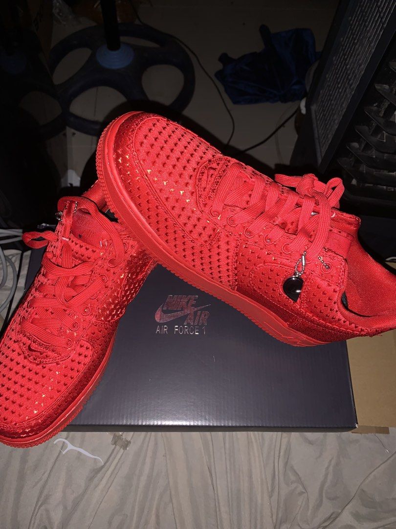 Nike Air Force 1 Red Sneakers (Category: Sneakers) located in Manila. Submitted by khianyanique (Listing ID 1463332351, Image 1). Description: - Red Nike Air Force 1s - Unique textured material with small gold accents - Comes with original box - Statement piece, don't miss out!.