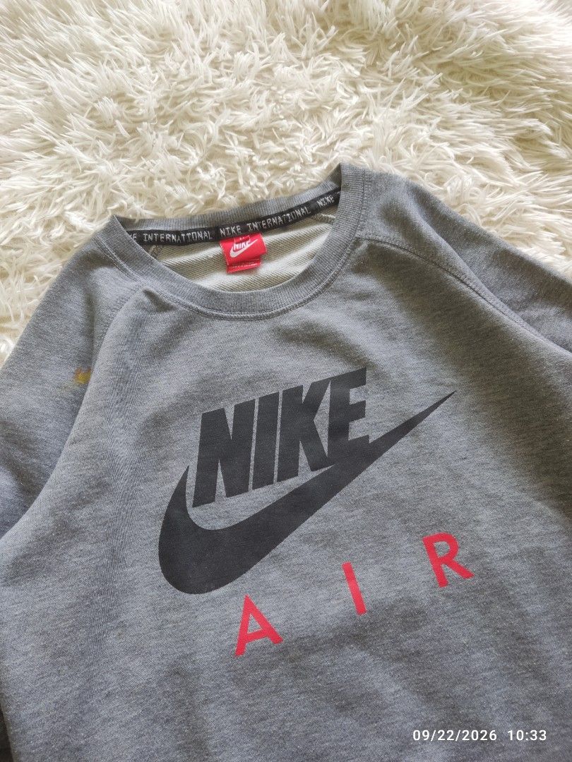 Nike Air Sweatshirt (Category: Coats, Jackets and Outerwear) located in Bulacan. Submitted by thr1ft_things (Listing ID 1463344509, Image 3). Description: Nike Air Gray Sweatshirt Size: Medium on Tag Dimes: W 19.5 × L 25 Armpit Sleeve Length 18.5 Shoulder Sleeve Length 26.5 Color Rate: 9/10 Issue: Stain.