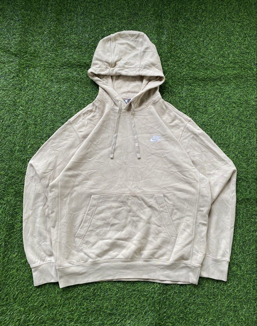 Nike Beige Pullover Hoodie (Category: Hoodies) located in Manila. Submitted by clevermountain_9c1516 (Listing ID 1463551380, Image 1). Description: - Classic beige Nike hoodie - Size: Large - Iconic embroidered Nike swoosh logo on chest - Front kangaroo pocket - Adjustable drawstring hood - Made in Vietnam -24 width 28 length .